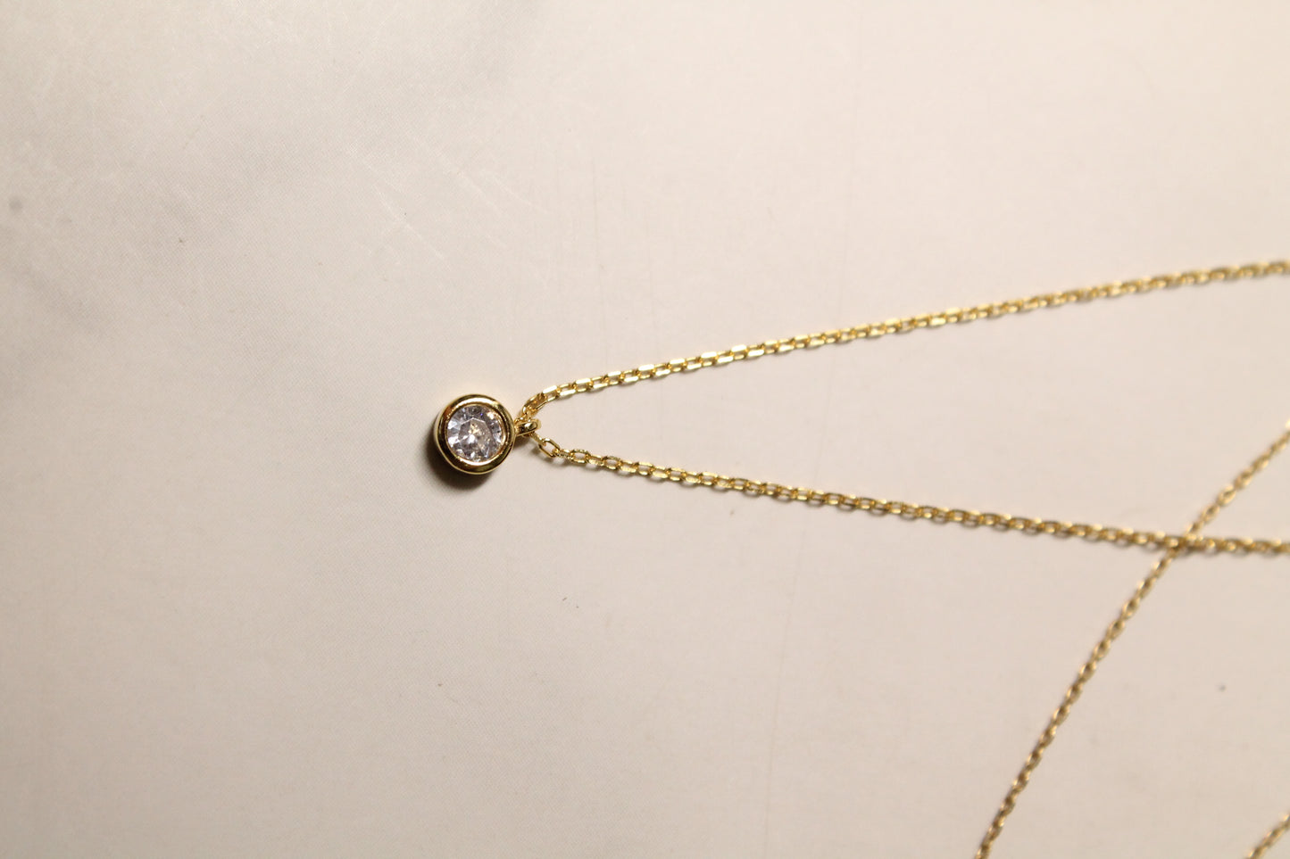 Collar punto de luz, plata 925, enchapado en oro 18k y zirconita.