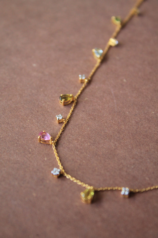 Collar borlas de oro amarillo, turmalina y brillantes.