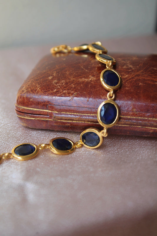 Pulsera metal plata 925, enchape de oro y zafiros