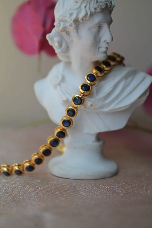 Pulsera metal plata 925, con enchape de oro y zafiros